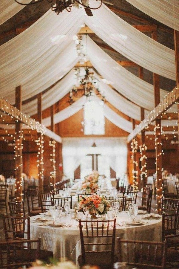 barn wedding reception ideas with lights and fabric