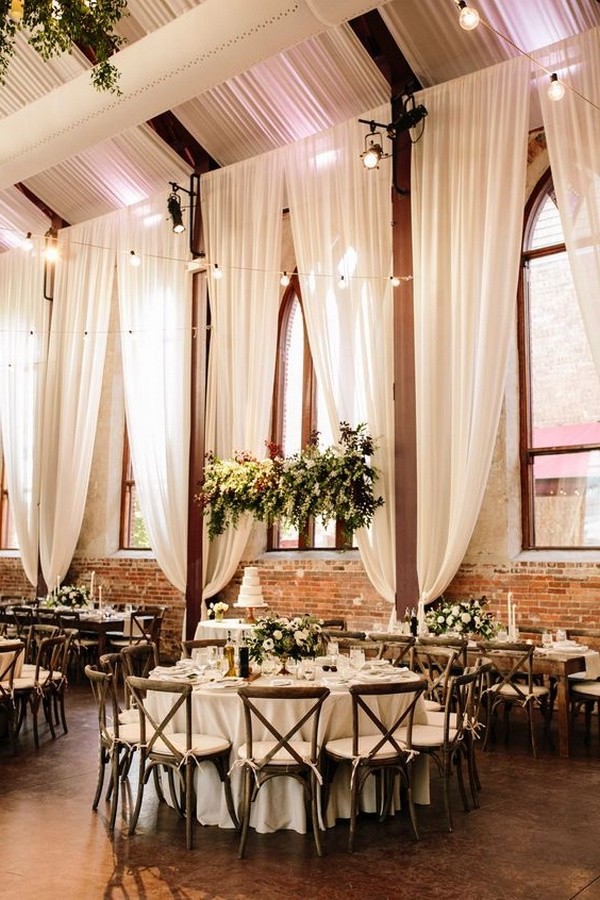 romantic wedding reception with ivory draping