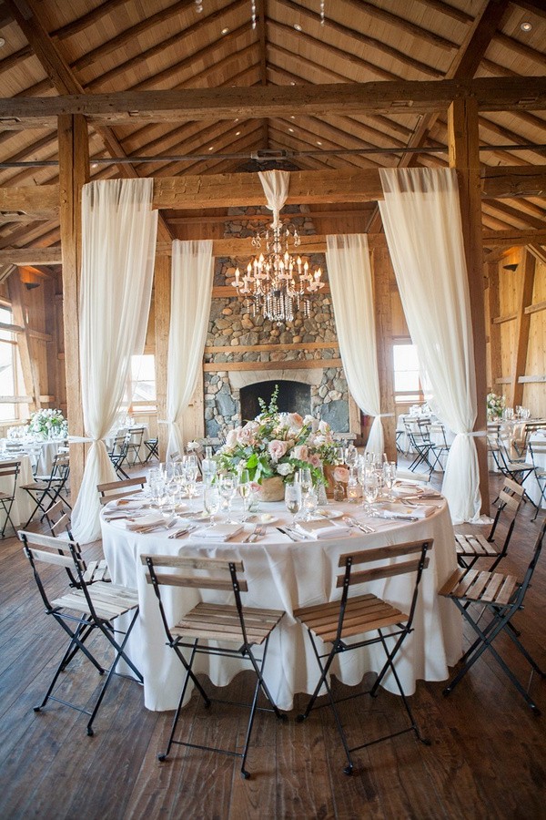 rustic barn wedding reception with fabric draping