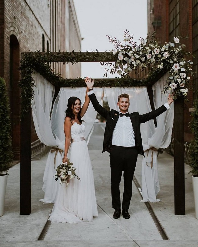 Bride And Groom Under Arch Wedding Photos #wedding #photos #weddingphotos #arches #weddingarches