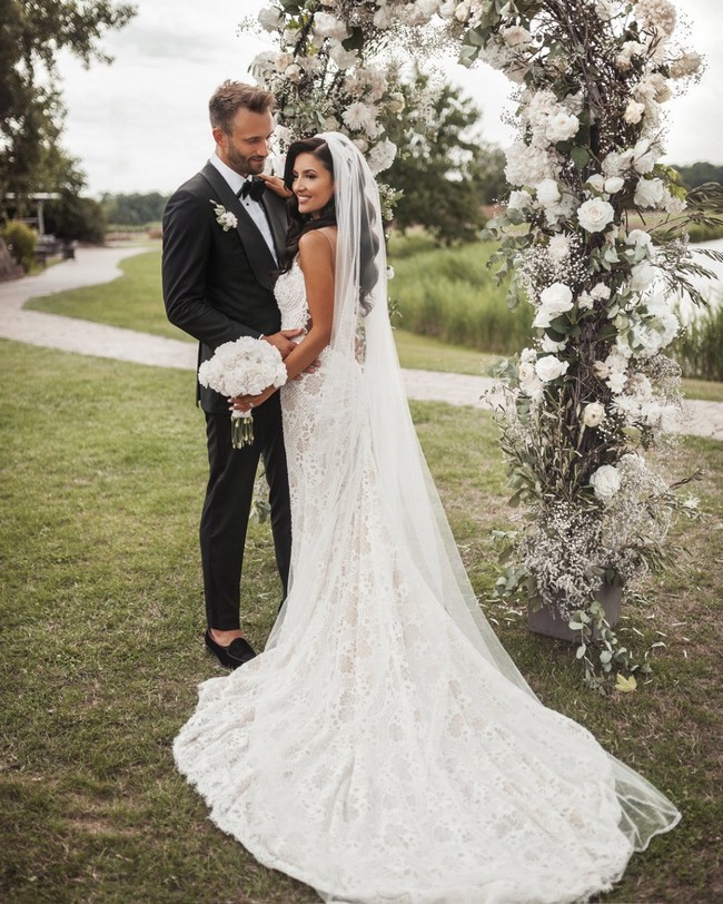 Bride And Groom Under Arch Wedding Photos #wedding #photos #weddingphotos #arches #weddingarches