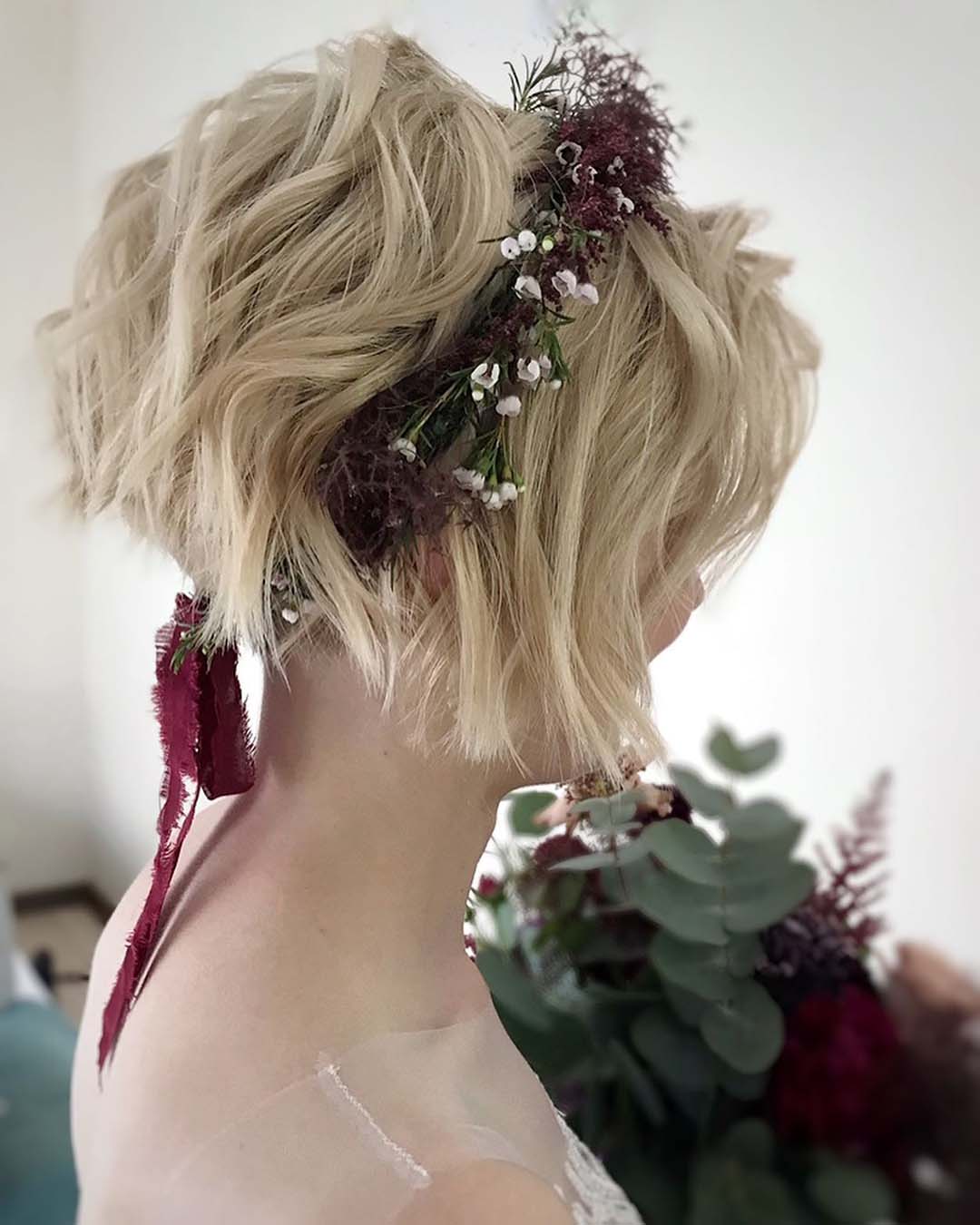 37 Wedding Hairstyles With Flowers That Will Stay Put