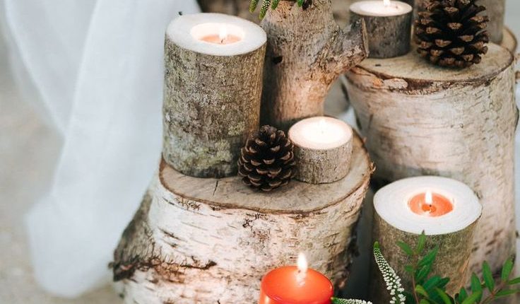 winter bridal shower ideas green and red rustic candles and stumps